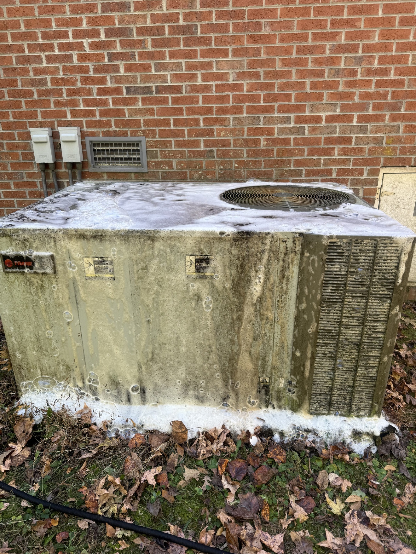Trane packaged HVAC unit during a deep coil cleaning service in Chattanooga, TN
